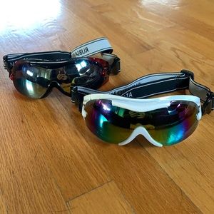 Worn once - 2 pairs of goggles - red & white